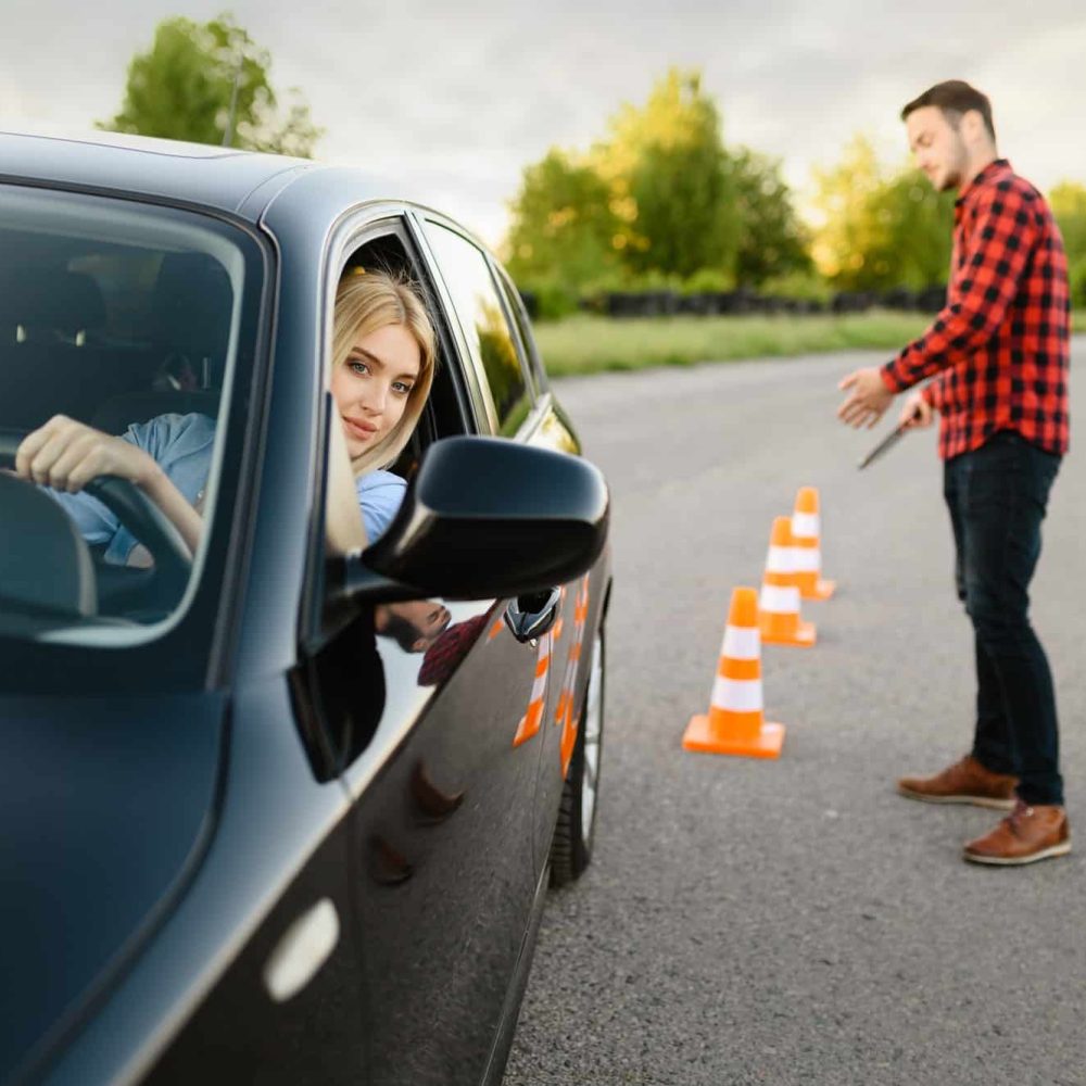 male-instructor-happy-with-driving-of-his-student-1.jpg